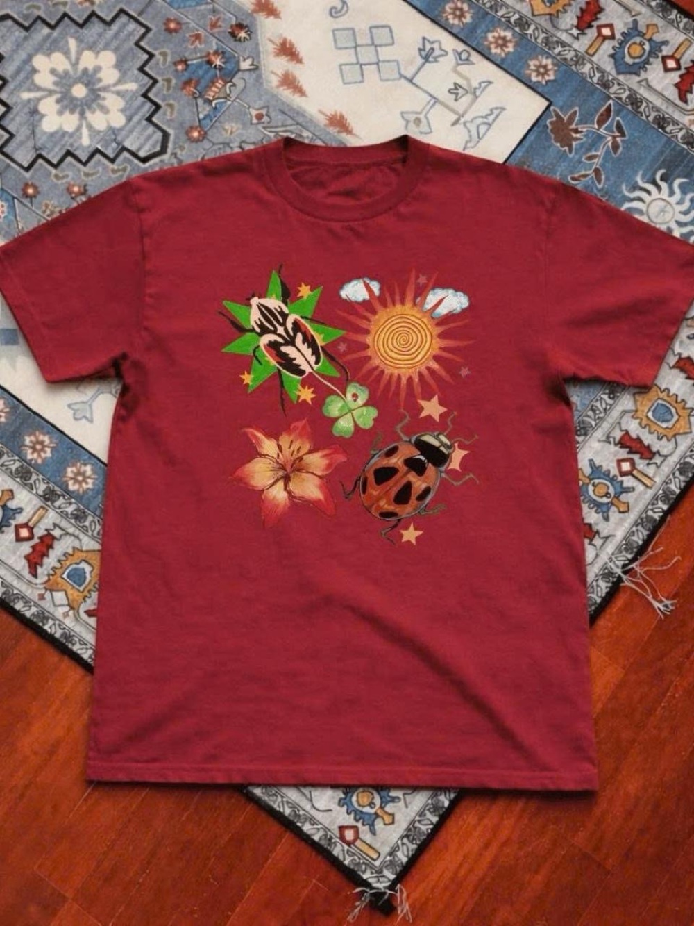 Gildan Maroon Graphic Tee with Sun, Ladybug & Floral Motifs